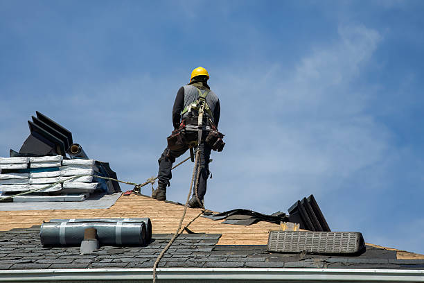Professional Roof Replacement technician working in Cliff Island, ME